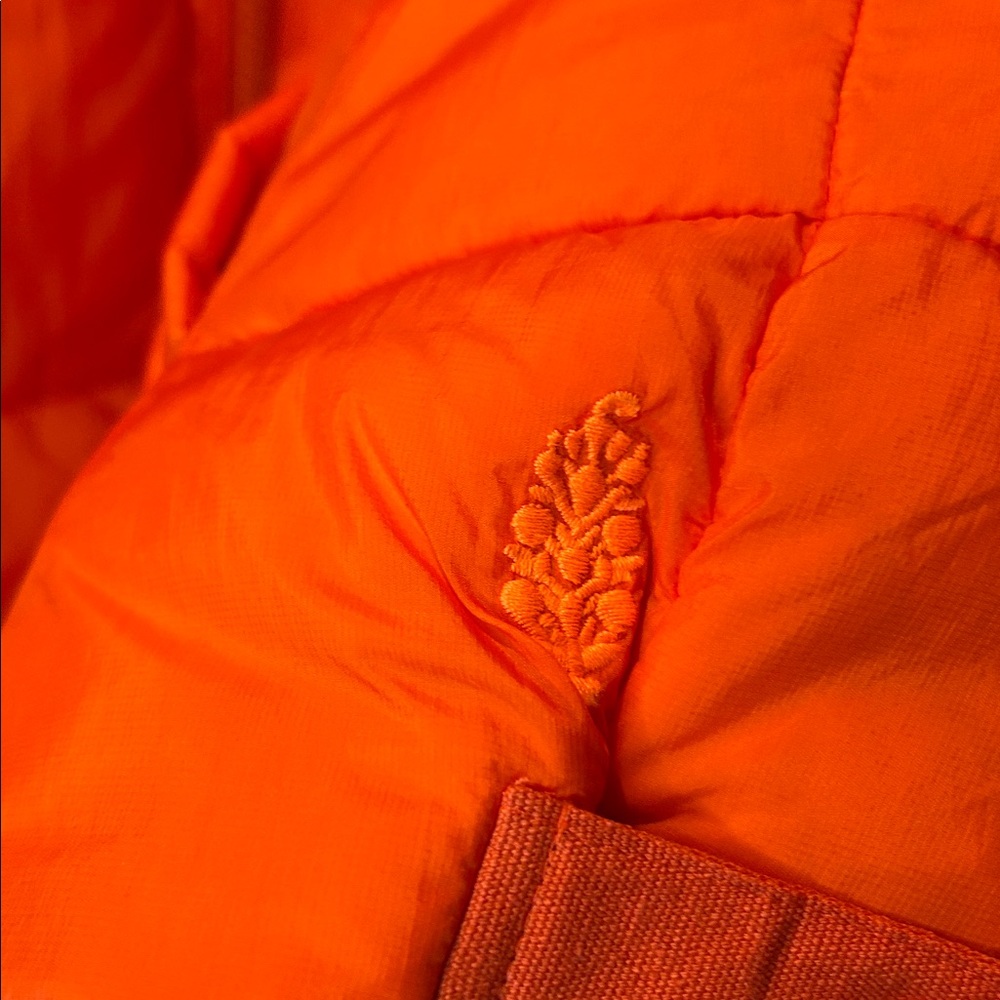 Free People Movement in a bubble Bright Orange Puffer Vest - Picture 3 of 7